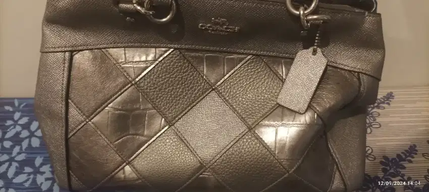 Tas coach preloved