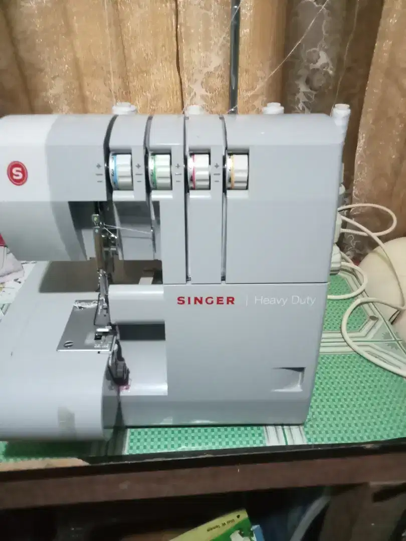 mesin obras portable merk singer