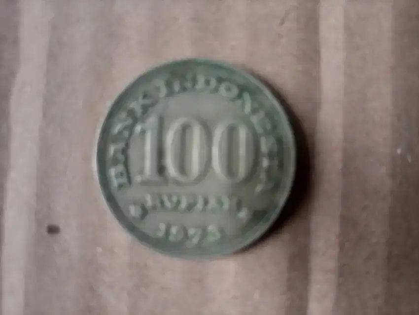 uang koin Rp 100 edisi 1973