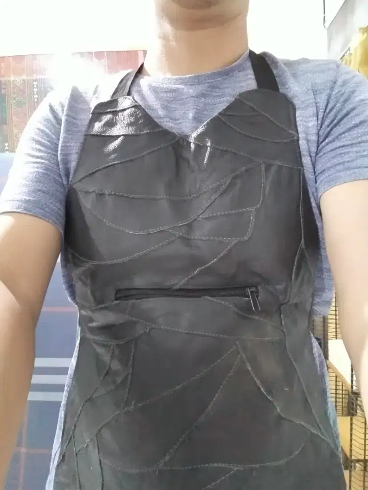 Pelindung dada bahan kulit