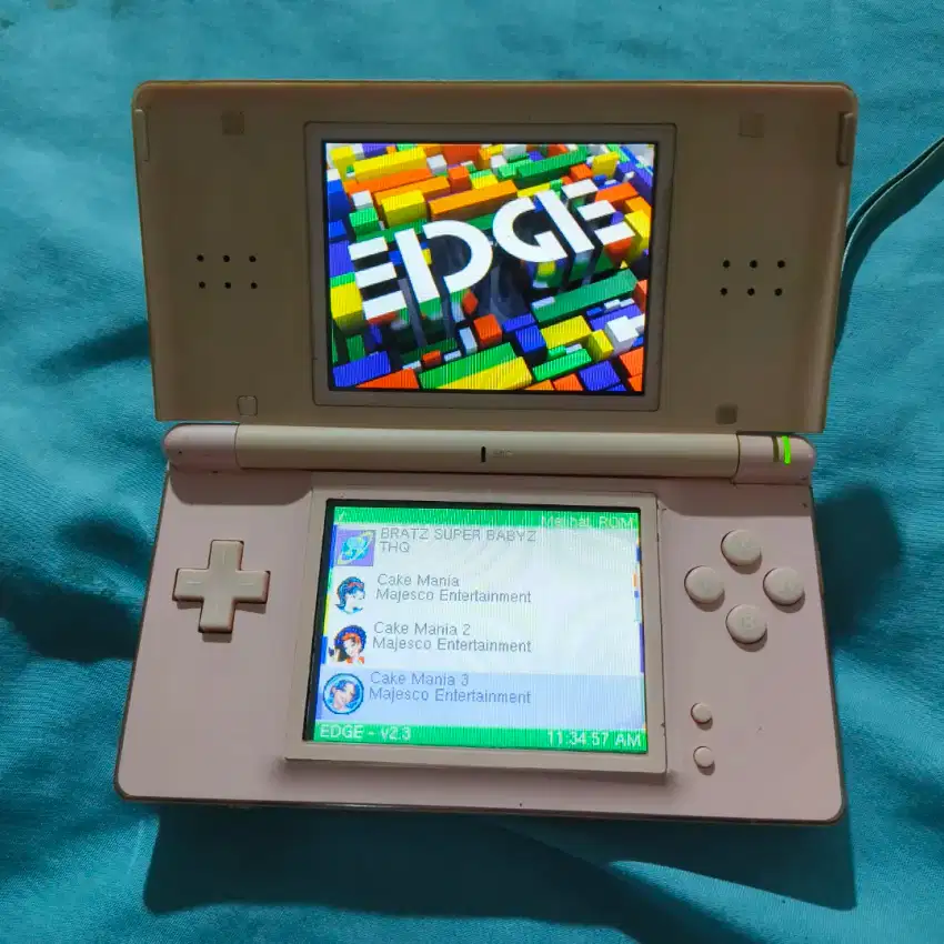 Nintendo DS lite pink bagus ada edge flash kaset banyak game