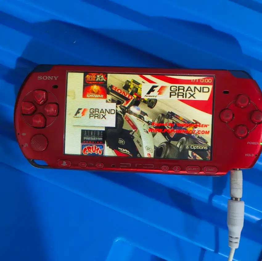 Psp slim 3006 normal warna merah full dan ada yg merah paduan hitam