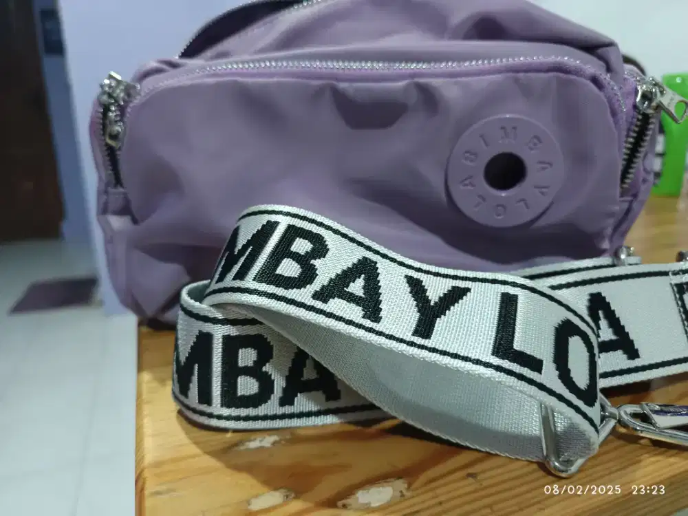 Tas selempang bimba. Y. Lola
