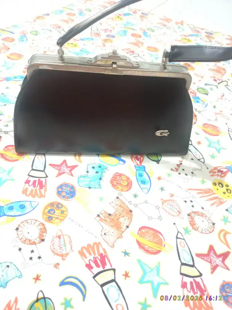 Tas Guchi untuk pesta