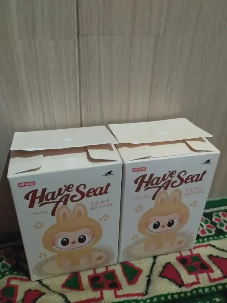 Labubu asli pop mart have a seat