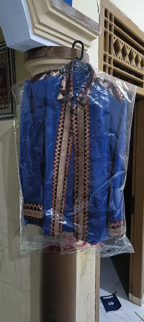 Kemeja tapis tangan panjang