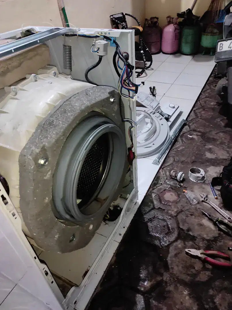 SERVICE MESIN CUCI FRON LODING