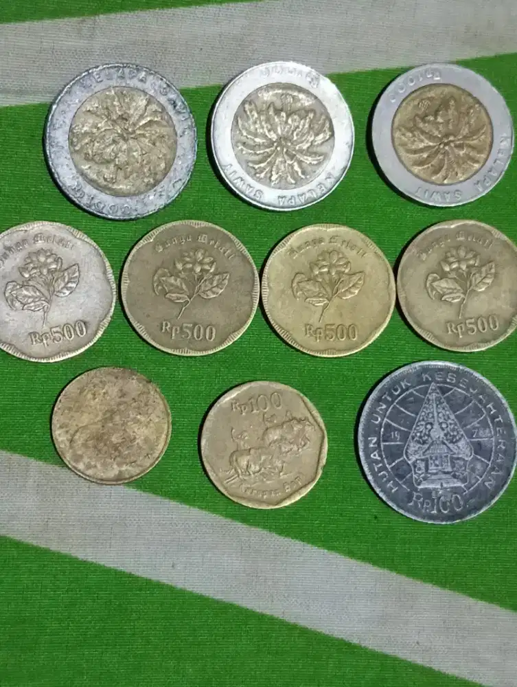 Uang coin lama seribulimaratus