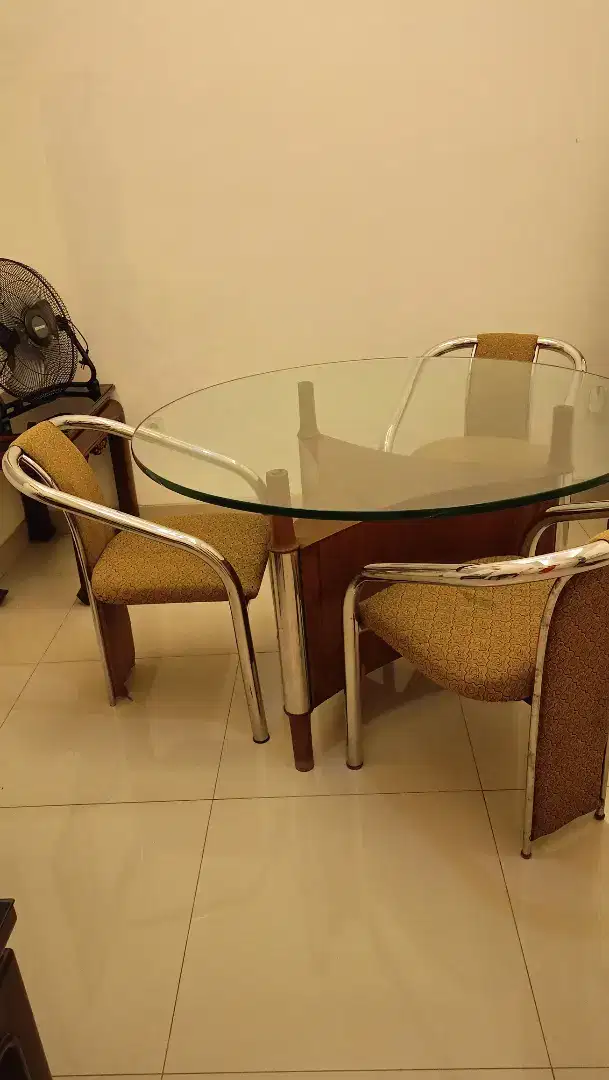 Meja makan jati stainless bundar kaca tebal