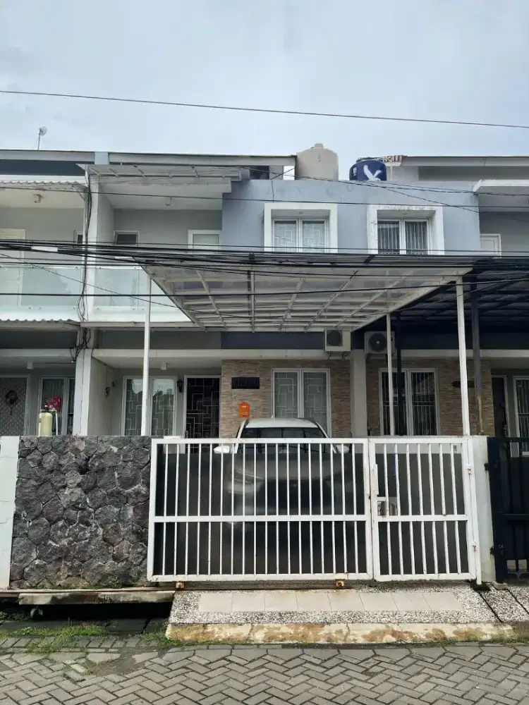 Rumah 2 lantai hdp timur Taman surya 5.