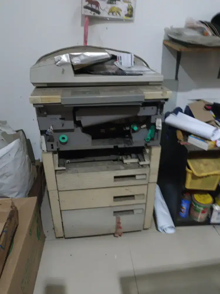 Mesin fotocopy tinggal service