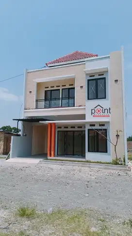 Rumah 2 Lantai Dengan Konsep Arsitektur Minimalis Tropis