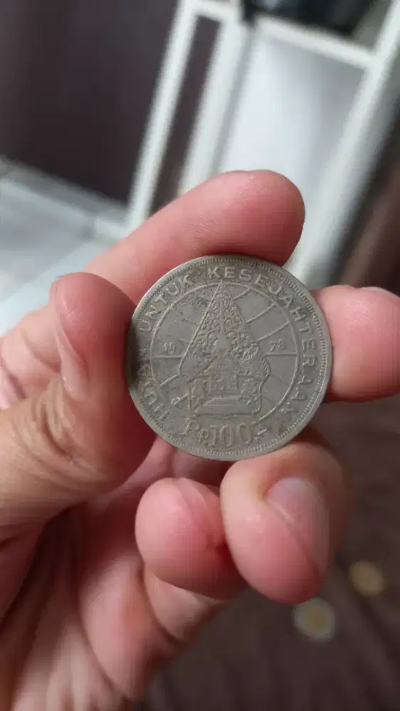 Koin 100 rumah gadang