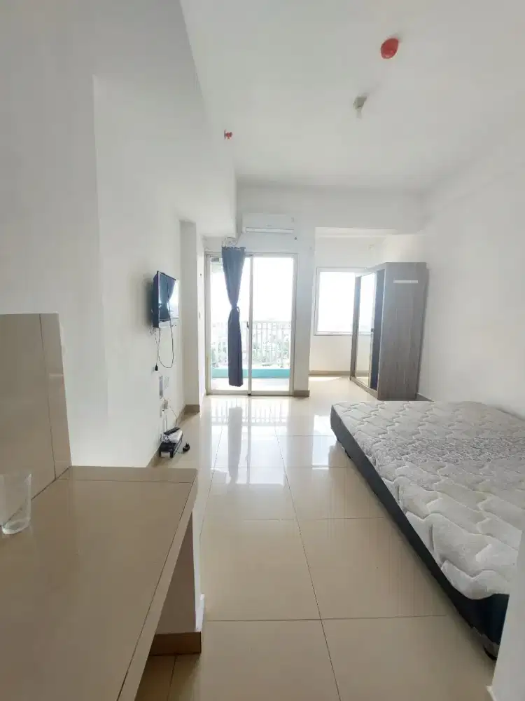 DiSewakan termurah studio Semi furnish Apartement The Nest