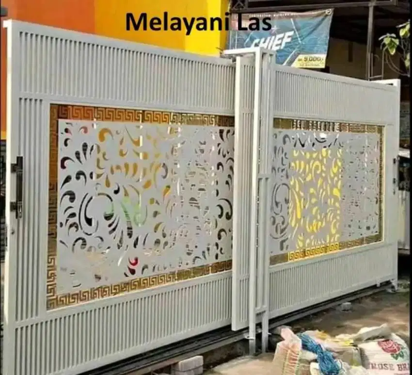 Pagar gerbang minimalis mewah motip pelat cutting laser