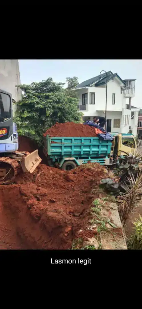 tanah merah urug mobil puing sampah