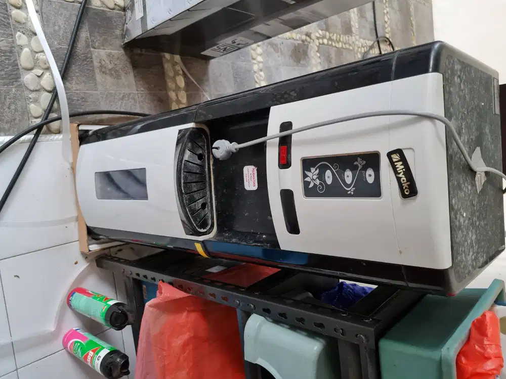 Dispenser galon bawah, miyako WDP 200, tahun beli 2019