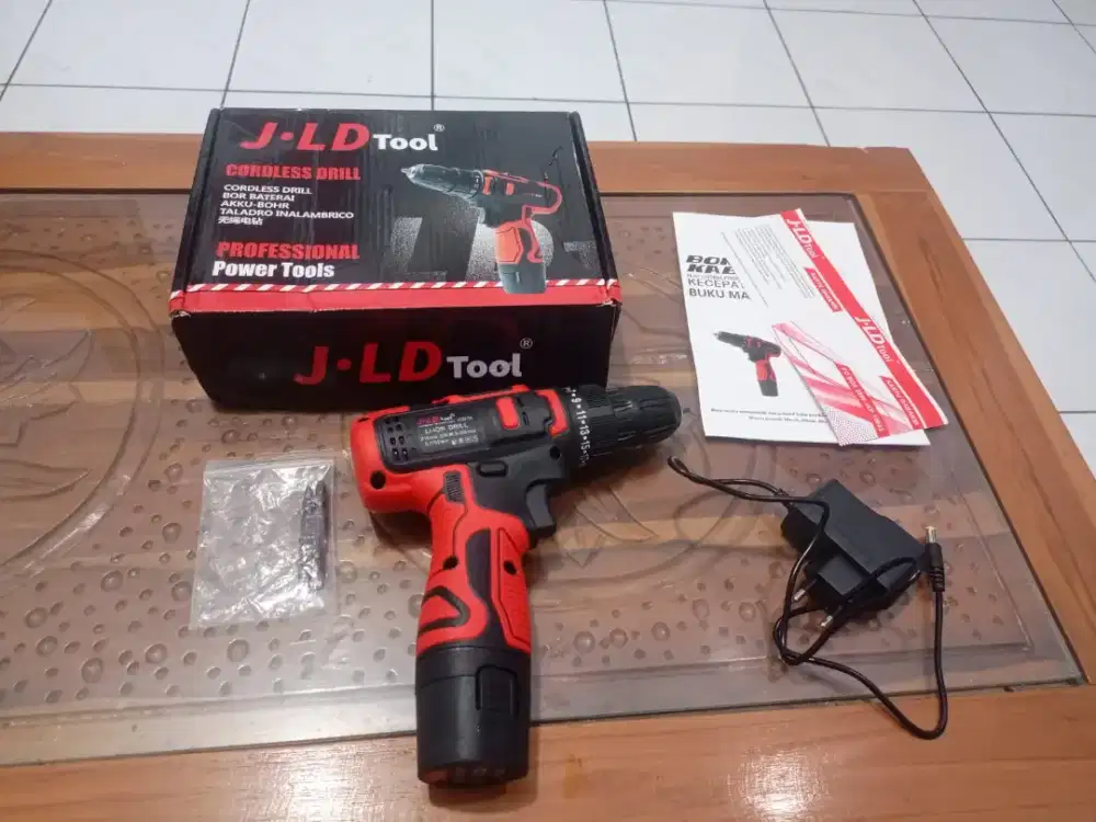 mesin bor/skrup bolak balik batre merk JLD kondisi baru normal siap ok