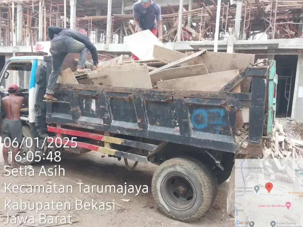 Buang puing bangunan