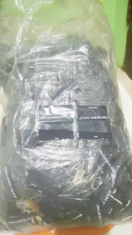 Label/ Merk John Ashley