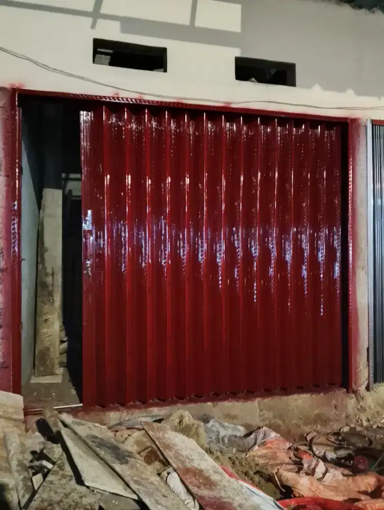 Folding gate rolling door