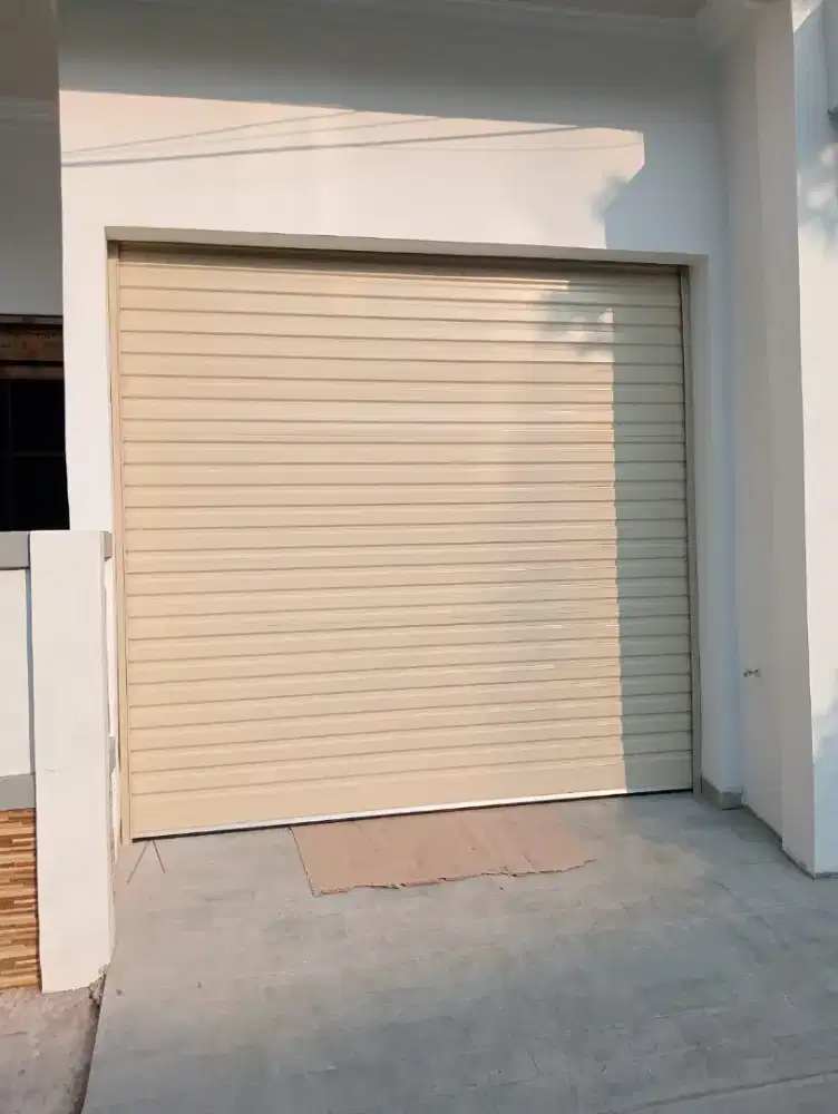 Folding gate rolling door
