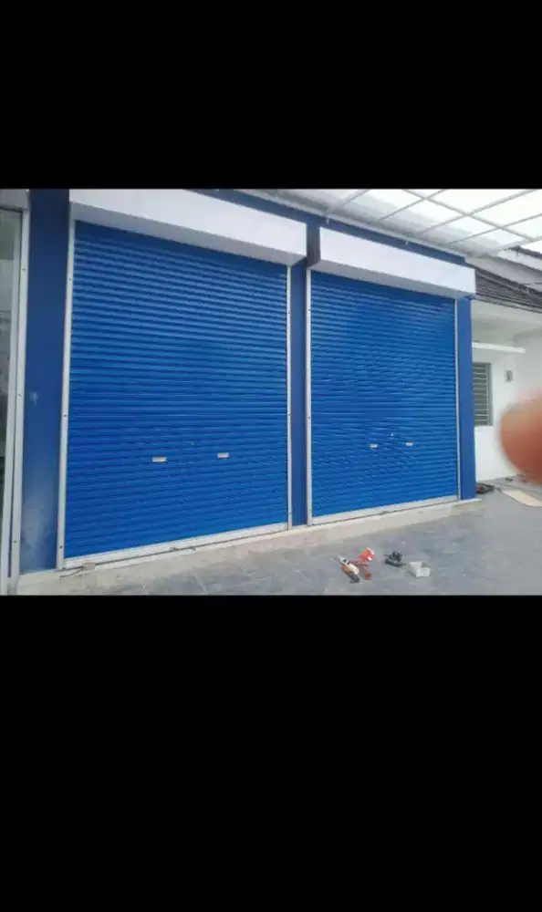 Folding gate rolling door