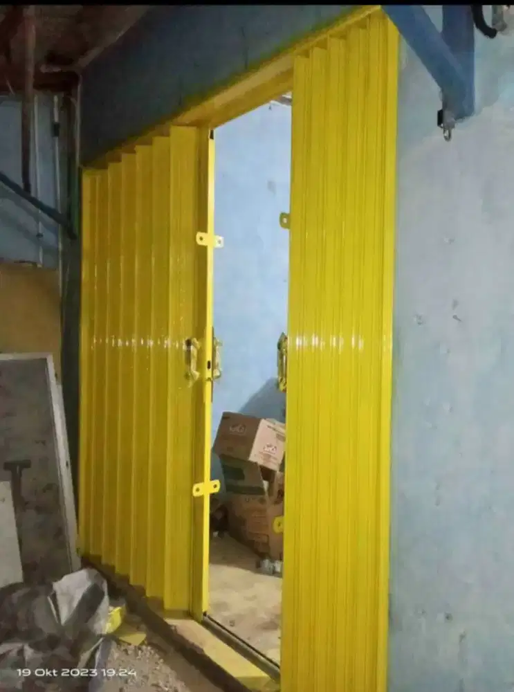 Folding gate rolling door