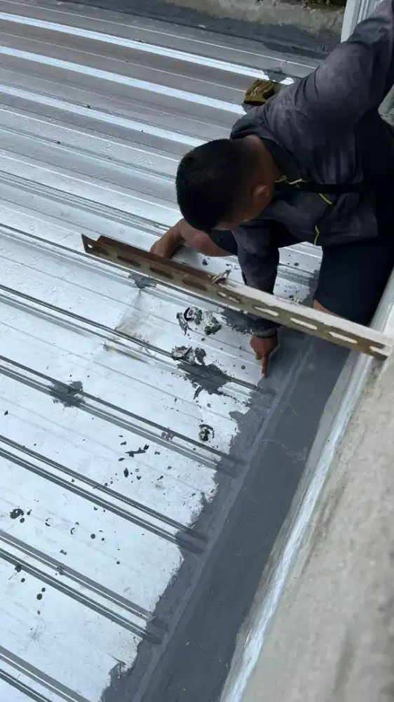 Tukang bangunan terpercaya