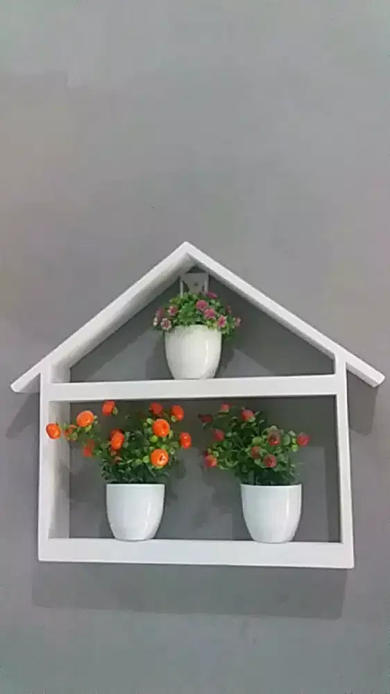 Rak buku rak bunga minilalis castem