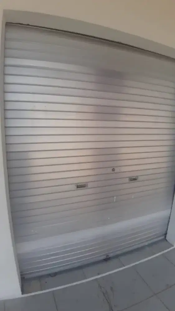 Folding gate rolling door