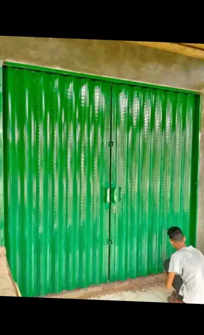Folding gate rolling door