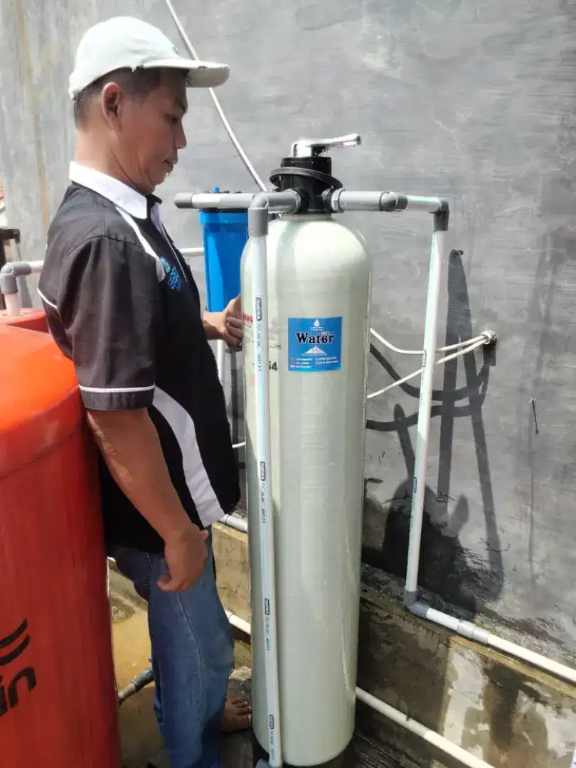 Filter penyaringan air warna kuning berminyak bau keruh zat besi dll