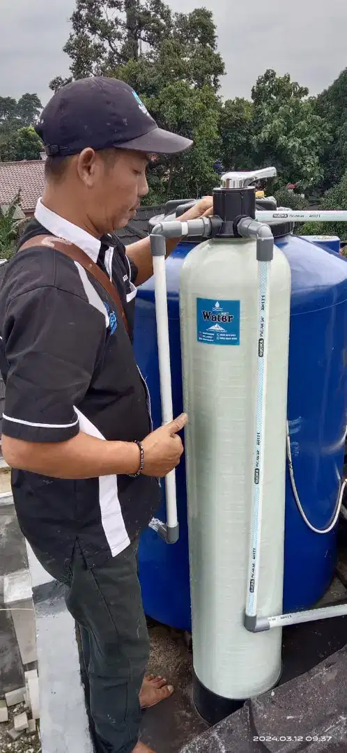 Filter saringan air warna kuning bau berminyak zat besi kapur dll.