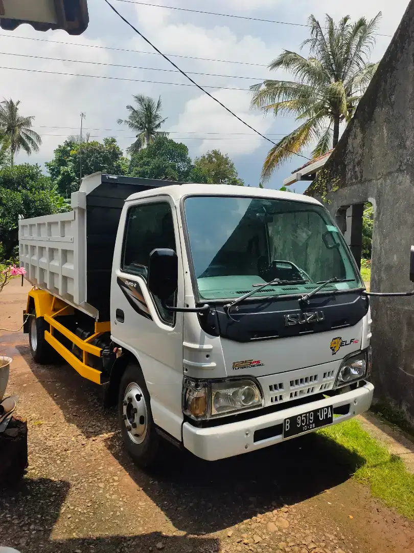 Di jual trus isuzu elf dump macan tahun 2014