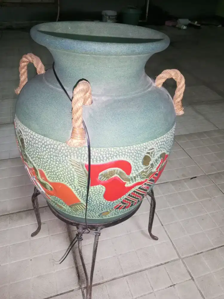 Antik unik guci tanah Motif Rp 250rb
