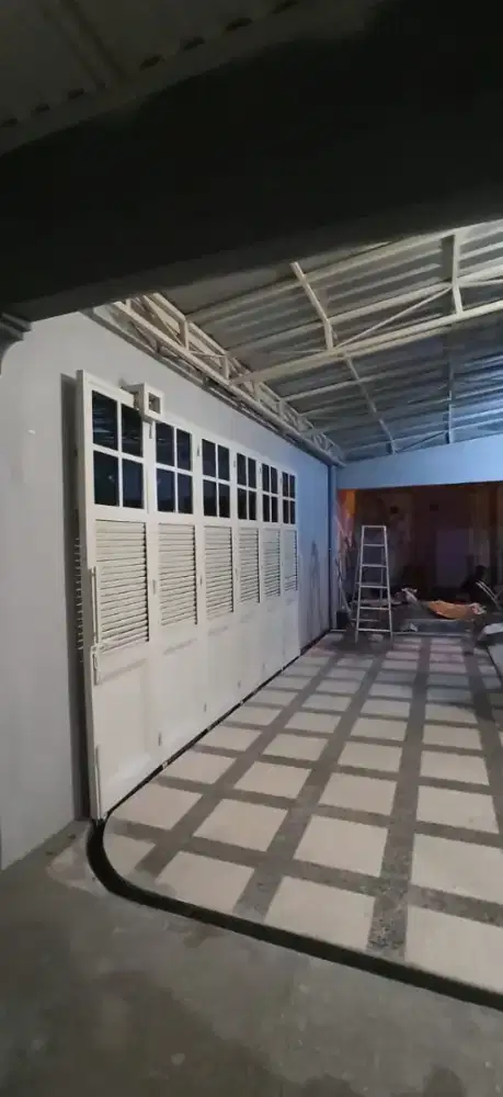 Pagar pintu garasi lipat tikung