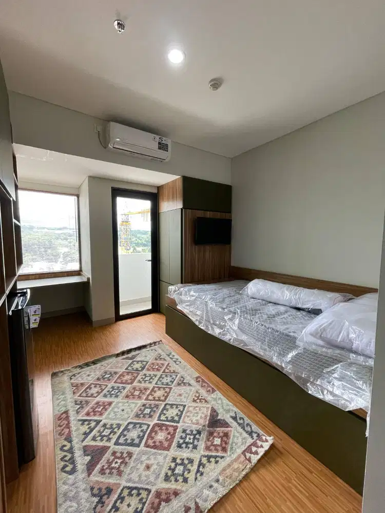 Sewa Apartemen Louving Unit 906