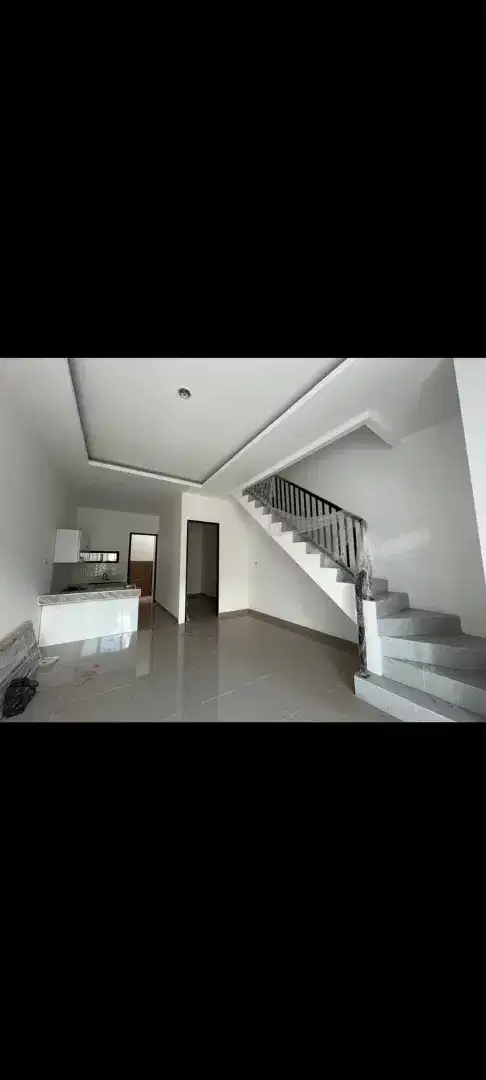 rumah pusat kota tenang nyaman