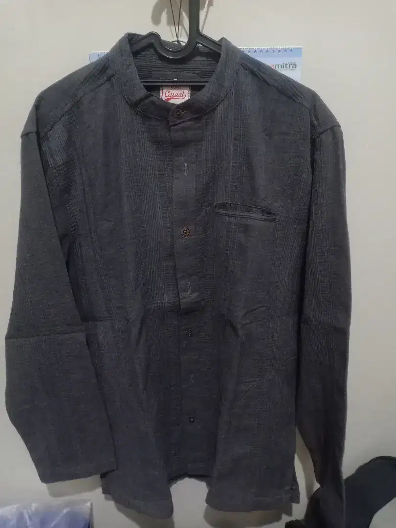 Baju Koko Merk Carvil