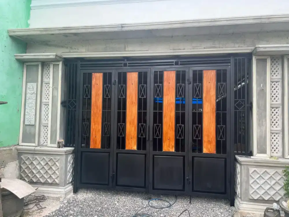 Pintu lipat garasi kombinasi listplang