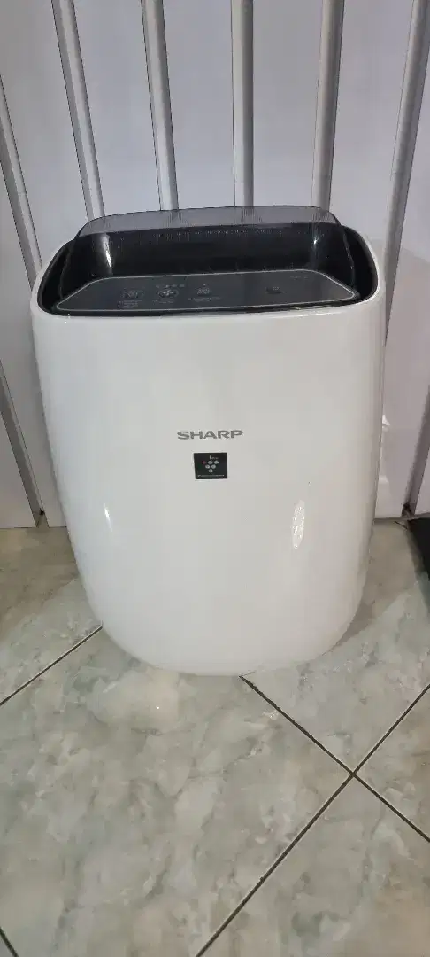 Air Furifier pemurni udara kamar merk SHARP FP-J40Y-W anti virus low W