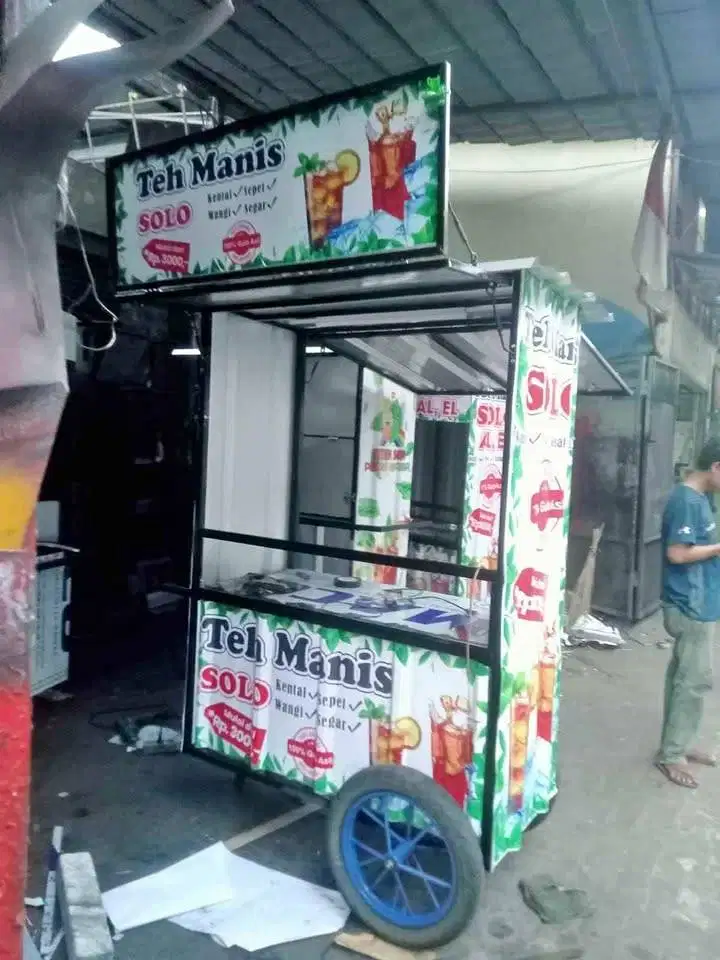 Paket Es Teh Solo Dengan model Gerobak terbaru ada atap bergambar