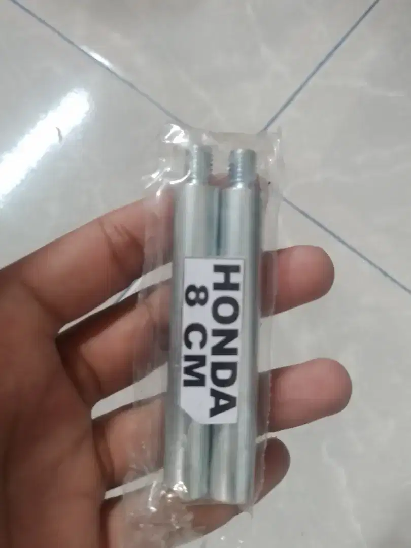 Peninggi shock depan motor.