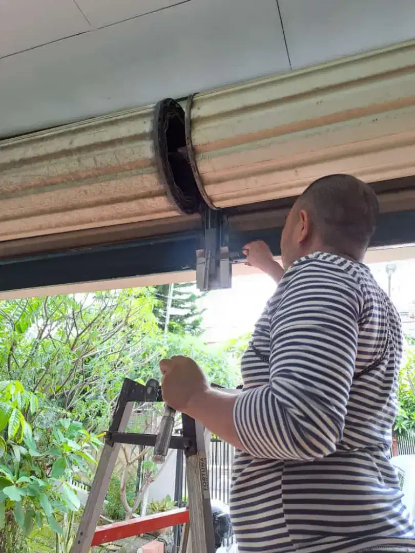 Tukang benerin pintu rolling door dan pintu folding gate murah