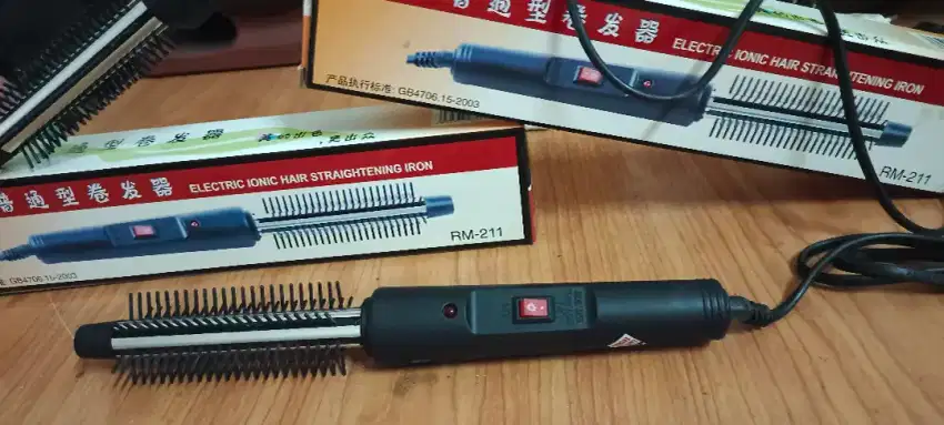 Alat pelurus rambut merk cina