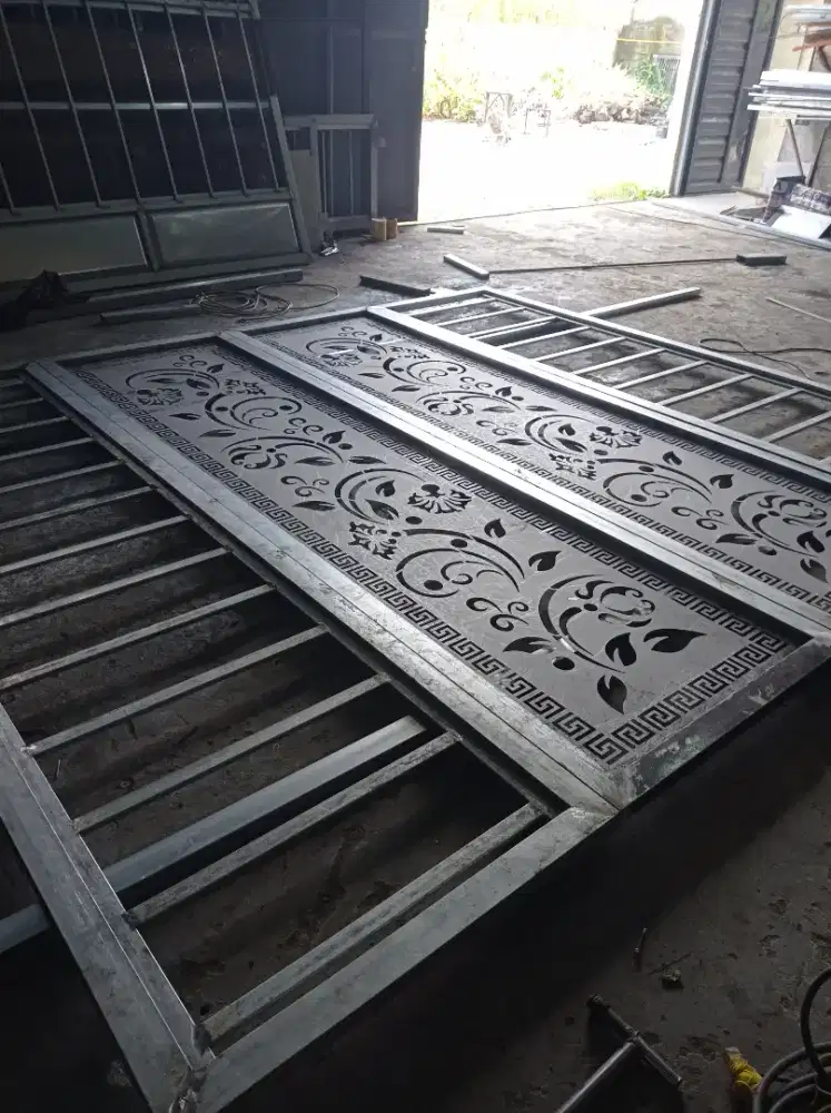 pintu pagar besi dg motif cuting plasma