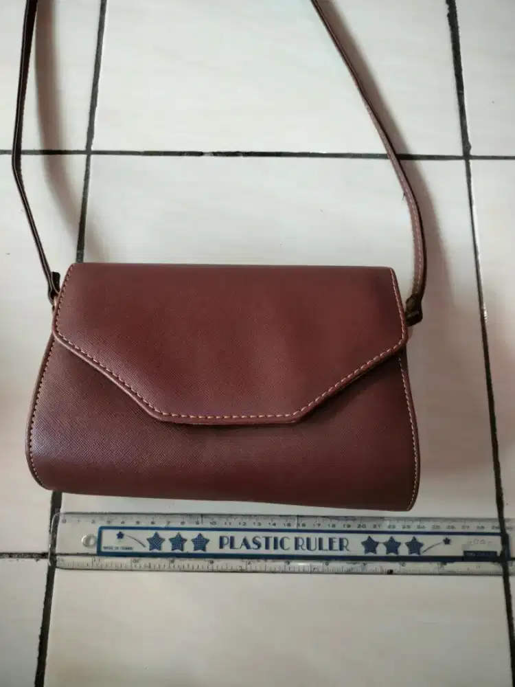 Tas kondangan kulit sapi