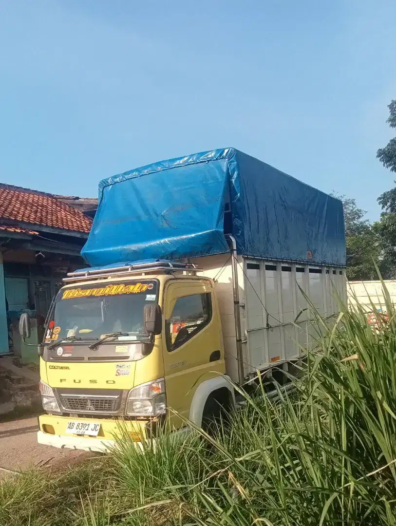 Jasa angkut engkel truk pindahan paket cargo logistic