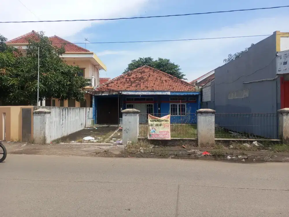 Jual rumah di pinggir jalan